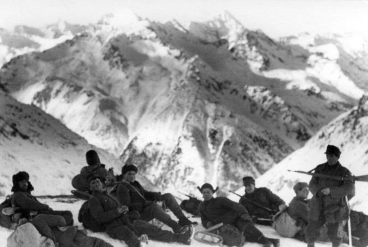 German soldiers from the mountain troops, in the snow having a rest, Caucasus, Soviet Union. By Bundesarchiv – CC BY-SA 3.0 de