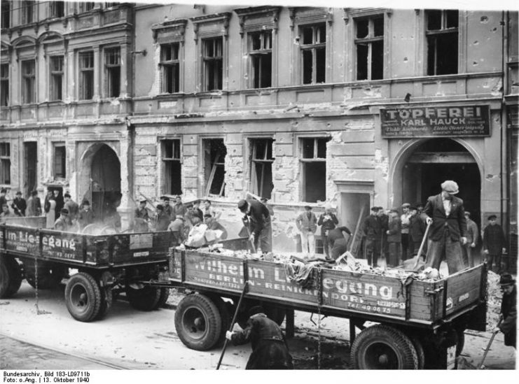 A work party clears rubble from an air-raid on Berlin, 13 October 1940 Photo by Bundesarchiv, Bild 183-L09711b / CC-BY-SA 3.0