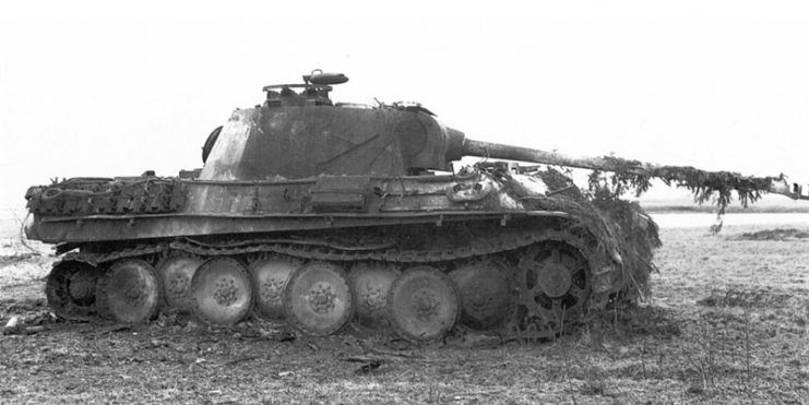 Burnt out Panther Ausf.G at the Battle of the Bulge, penetrated in the sponson.