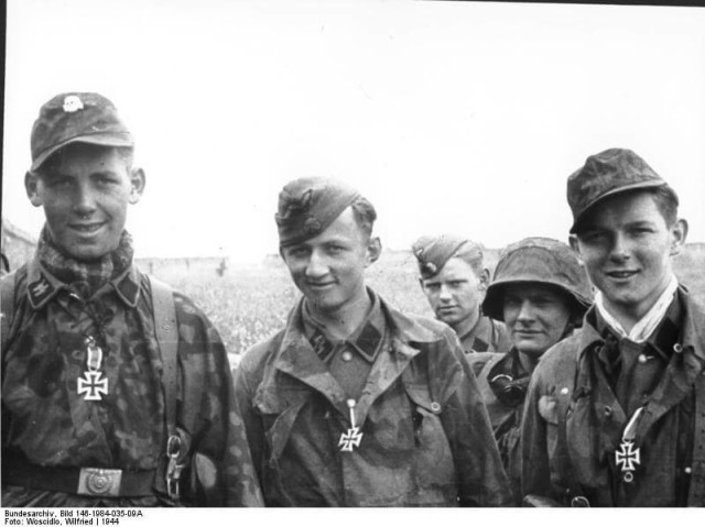 During their first week of action in Normandy, these three soldiers of the Hitlerjugend Division earned the Iron Cross. Bundesarchiv – CC-BY SA 3.0