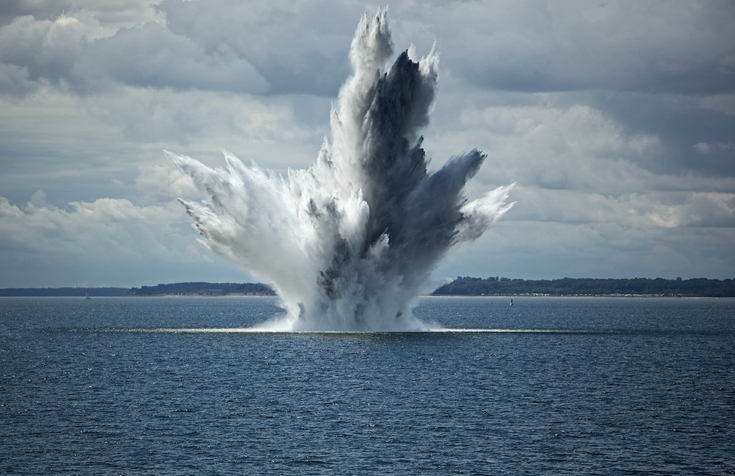 Huge Water Fountain caused by an below Surface Explosion of a Sea Mine in the Ocean
