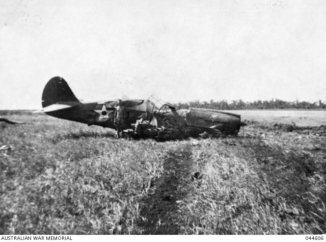 A crashed U.S. Army Air Force Curtiss P-40E Warhawk of the 33rd Pursuit Group (Provisional) at Darwin, Northern Territories (Australia). This was one of nine USAAF P-40s shot down during the Japanese Raid on Darwin on 19 February 1942.