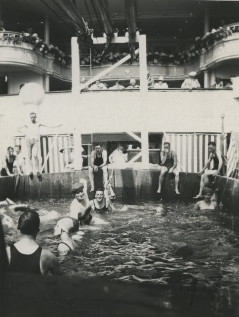 Passengers swimming in pool on ship St Louis deck