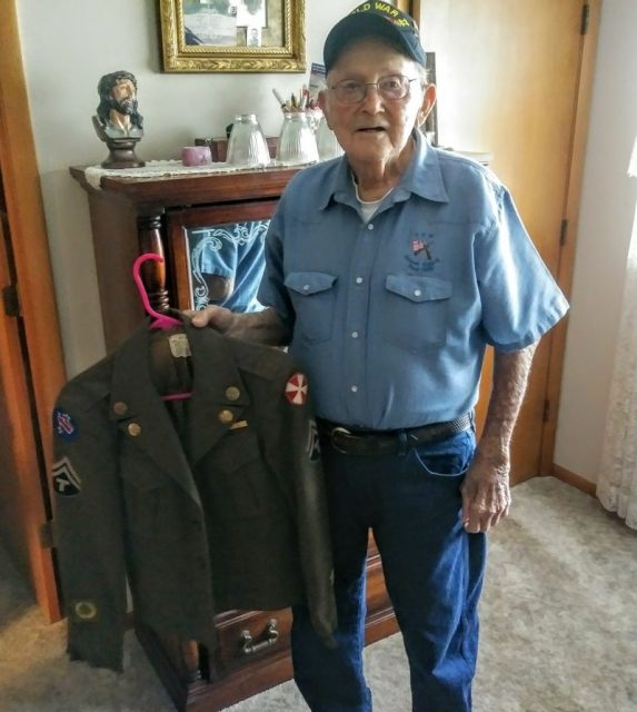 Holding the U.S. Army uniform from his post-WWII service, Taos, Missouri, veteran James Rackers stated, “The last time I wore this was in 1947.” He mirthfully added, “I can’t wear this anymore; I was a little smaller back then.” Courtesy of Jeremy P. Ämick