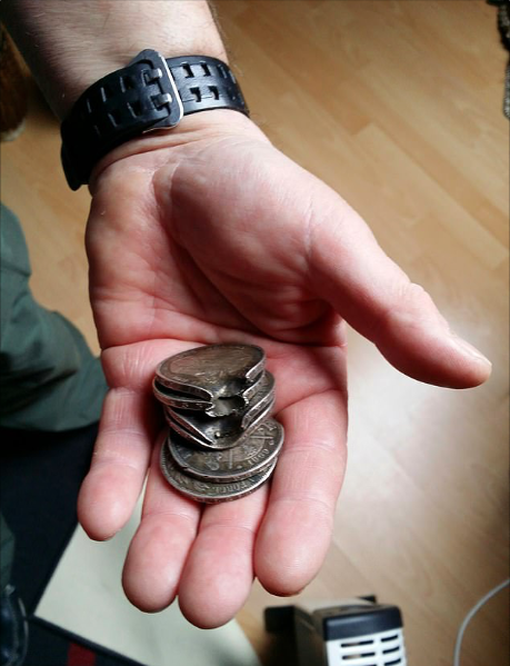 Unbelievable tale- The amazing story of Buyssens was shared on Reddit by his great-grandson Vincent Buyssens, seen here holding the life-saving coins.Photo by Vincent Buyssens
