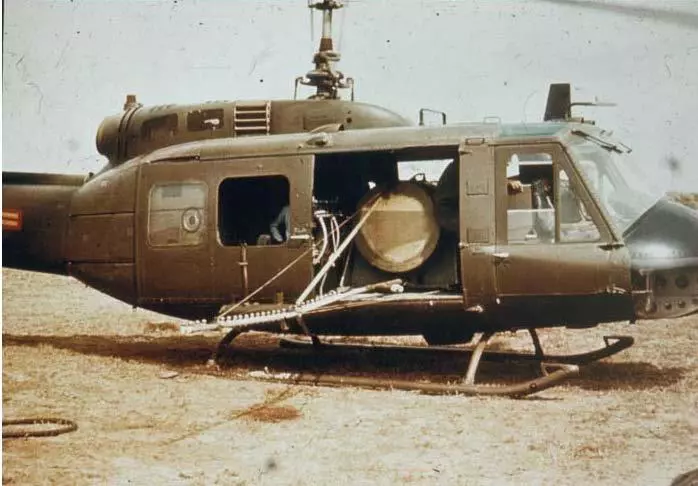 The Military UH-1 series of helicopters generally sprayed the herbicides. The most common spray systems were the HIDAL and AGRINAUTICS units. They could be removed from the aircraft in a matter of minutes. Each unit consisted of a 760- liter tank and a collapsible 9.8-meter spray boom (Photograph courtesy of the US Army Chemical Corps).