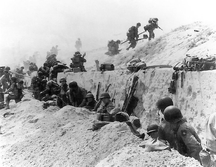 Men of the 4th Infantry Division move off the Utah Beachhead on D-Day.