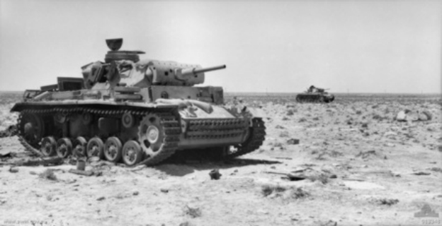 Two of seven German Panzer III destroyed by an Australian anti-tank battery near Tel el Eisa on 5 October 1942. A total of 17 German tanks were attacking.