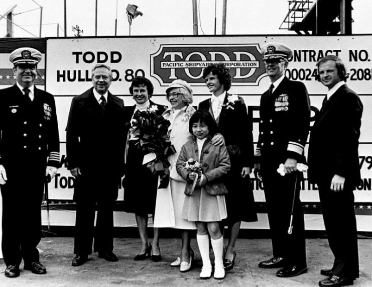 The launching party for the guided missile frigate ANTRIM (FFG-20) are from left to right: CAPT S. P. Passantino, Mrs. Carl R. Meurk, Mrs. Leonard Laylon, Mrs, Richard N. Antrim, Miss No Robertson, Mrs. William Walker, RADM Floyd H. Miller and Mr. Lance Antrim during the ship’s launching ceremony at Todd Pacific Shipyards Corporation in Seattle, Washington.