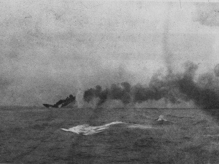 HMS Indefatigable sinking after being struck by shells from SMS Von der Tann Battle of Jutland