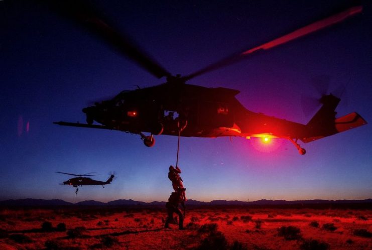 Members from the U.S. Air Force 24th Special Tactics Squadron, Fort Bragg, complete helo, fast rope and hoisting training during exercise Advanced Guard, Holloman Air Force Base, N.M., April 14, 2014. Advanced Guard is a multimillion dollar exercise spanning across the states to train special operators to conduct joint operations.