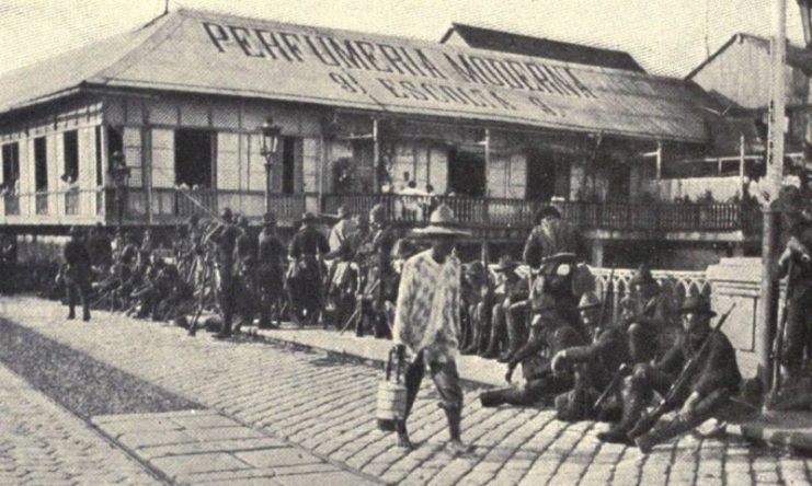 American soldiers guarding a bridge over the Pasig River after the battle, August 13, 1898