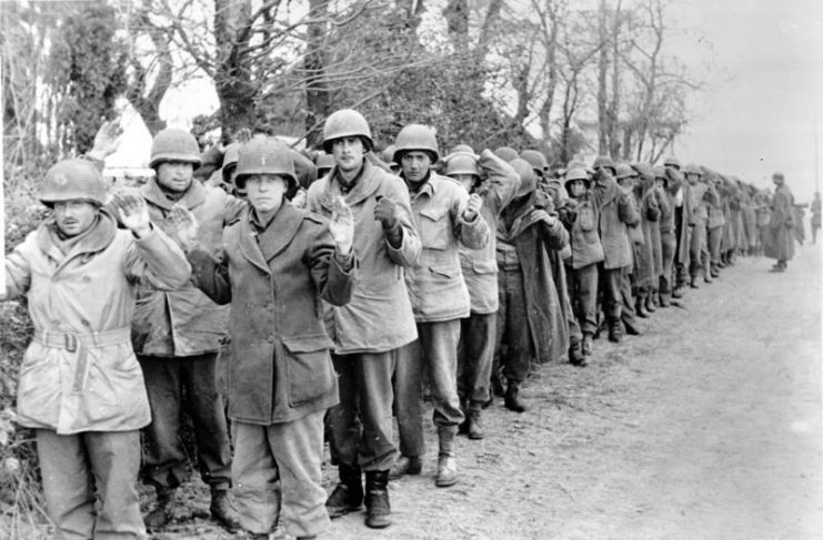 American prisoners captured by the Wehrmacht in the Ardennes in December 1944 Photo by Bundesarchiv, Bild 183-J28589 / CC-BY-SA 3.0
