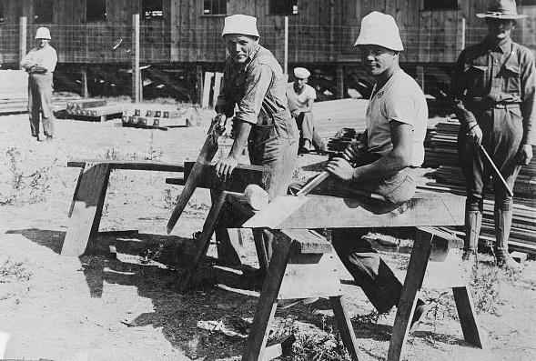 Germans building barracks in an internment camp during World War I.