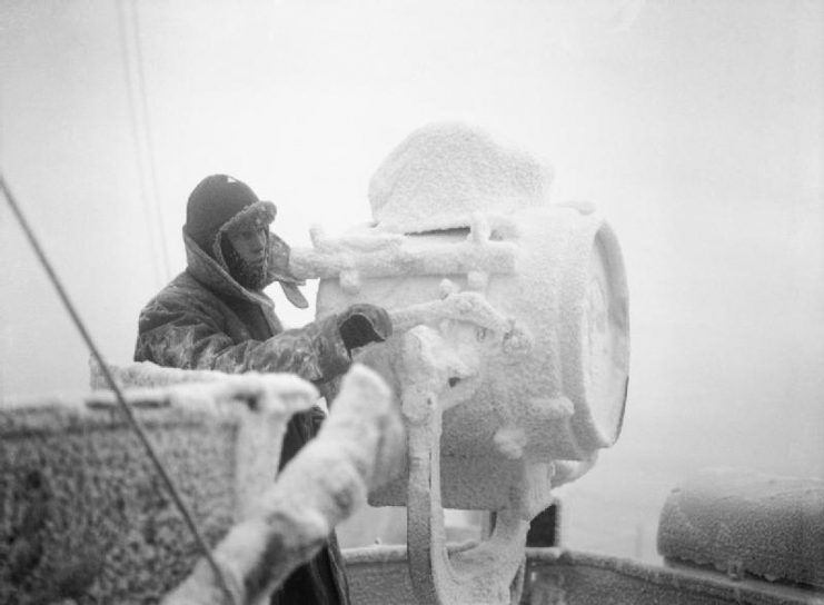 Rime ice on a 20-inch signal projector on the cruiser, HMS Sheffield (C24), escorting an Arctic convoy to the Soviet Union in World War II.