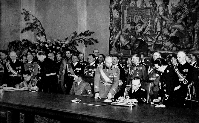 Galeazzo Ciano, Adolf Hitler, and Joachim Von Ribbentrop at the signing of the Pact of Steel in the Reichskanzlei in Berlin.