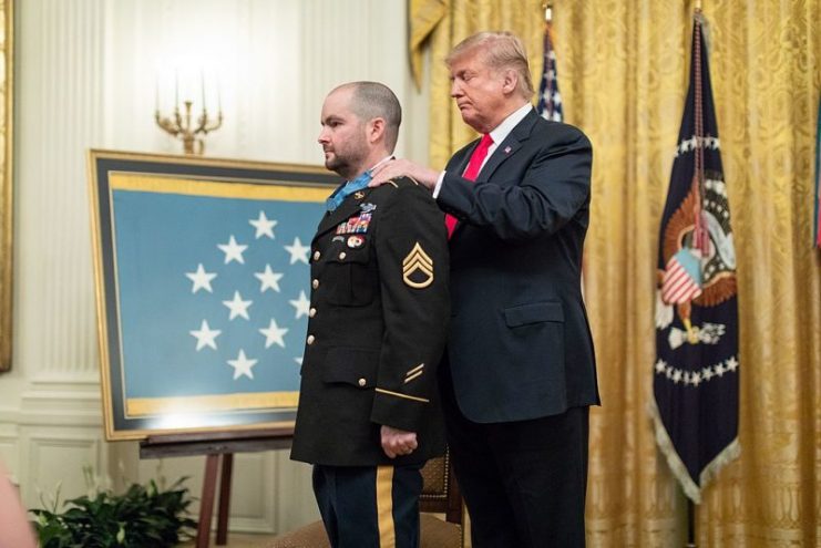 President Donald J. Trump presents the Medal of Honor to retired U.S. Army Staff Sgt. Ronald J. Shurer II Monday, Oct. 1, 2018, in the East Room of the White House.