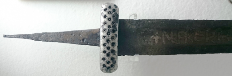 One of three Ulfberht swords found in the territory of the Volga Bulgars. Its hilt (classified as Petersen type T-2) is decorated with three lines of round holes inlaid with twisted silver wire.  Photo: Dbachmann CC BY-SA 4.0