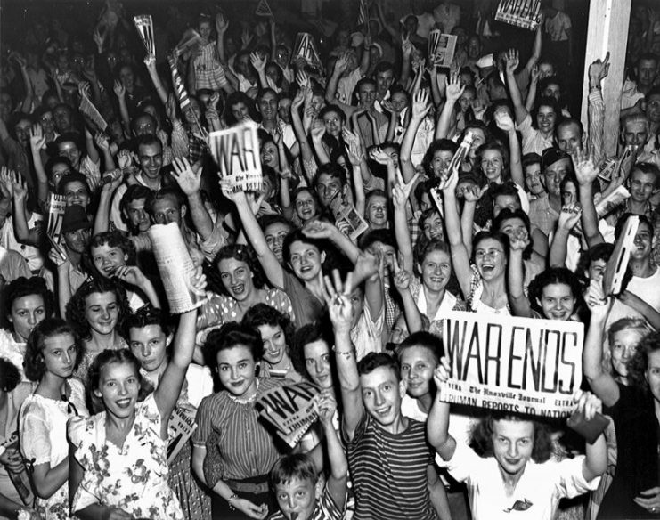 Citizens and workers of Oak Ridge, Tennessee celebrate V-J Day on August 14, 1945