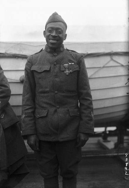 Johnson in 1919, wearing his Croix de Guerre. Note, too, the two wound chevrons on his lower right sleeve.