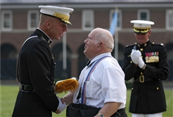 Lucas receives his Medal of Honor Flag from CMC Gen. Hagee on August 3, 2006.