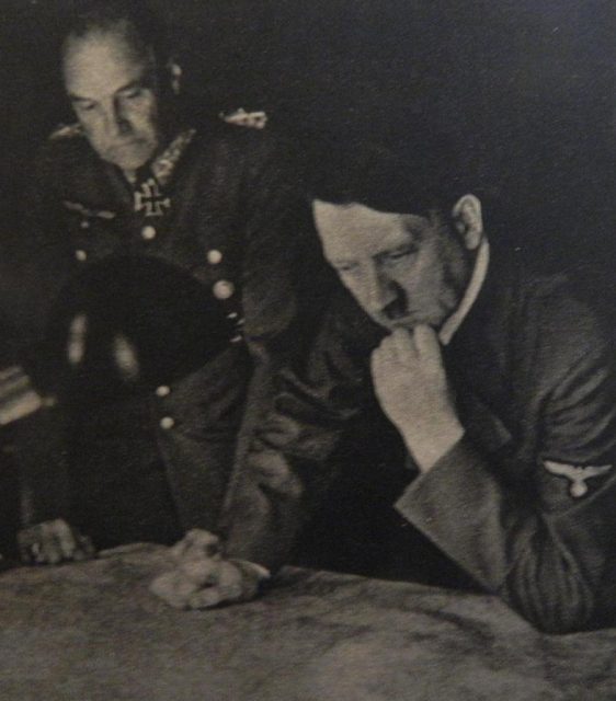 OKH commander Field Marshal Walther von Brauchitsch and Hitler study maps during the early days of Hitler’s Russian Campaign