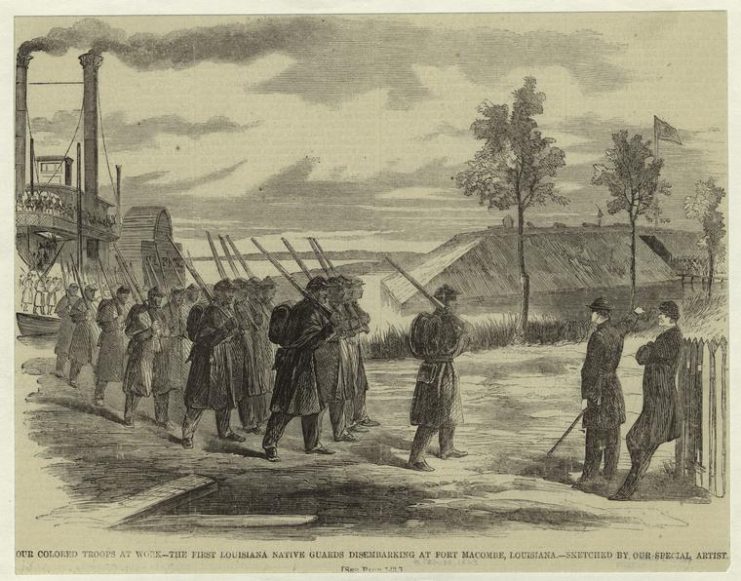 Troops of the Louisiana Native Guard disembarking at Fort Macomb, Louisiana, for guard duty.