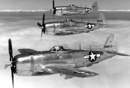 Republic P-47N-5 in three ship formation.
