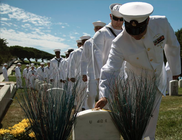 Sailors assigned to the future Zumwalt-class destroyer USS Michael Monsoor (DDG 1001) pays respects to fallen Master-at-Arms 2nd Class (SEAL) Michael Monsoor at Fort Rosecrans National Cemetery on the 10-year anniversary of his death.
