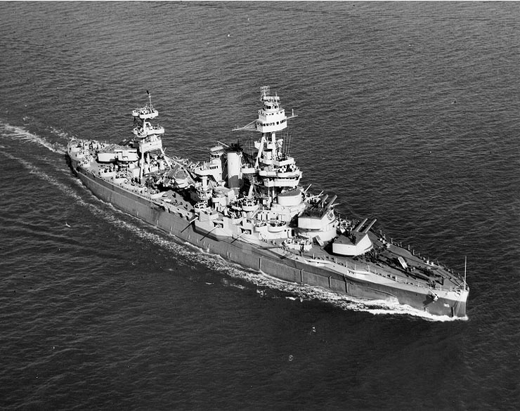 USS Texas (BB-35). Underway off Norfolk, Virginia, March 15, 1943, with her main battery gun turrets trained to port.