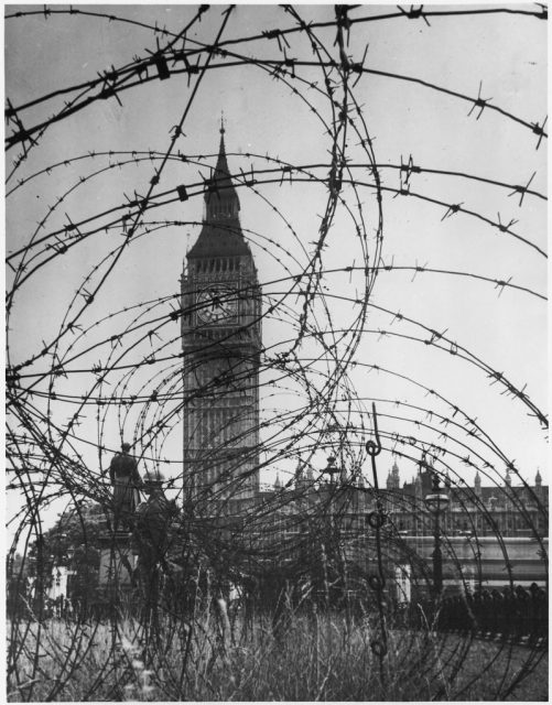 Big Ben with barbed wire entanglement WW2 – NARA – 195565.jpg