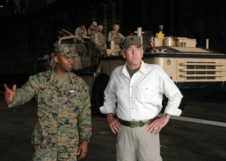 Gunnery Sgt. Elias Guy speaks with R. Lee Ermey, famed drill sergeant in the movie “Full Metal Jacket” in the well deck aboard USS Belleau Wood (LHA 3). U.S. Navy photo by Photographer’s Mate Airman Nelson A. Graca