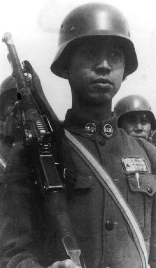 A Chinese Nationalist Army soldier equipped with a German M35 helmet and a ZB vz. 26.