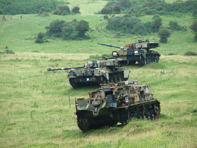 Armoured vehicles used as target practice, Lulworth Training Area. Lying to the north of Whiteway Hill are the tank ranges of Lulworth Camp.Photo: Gwyn Jones CC BY-SA 2.0