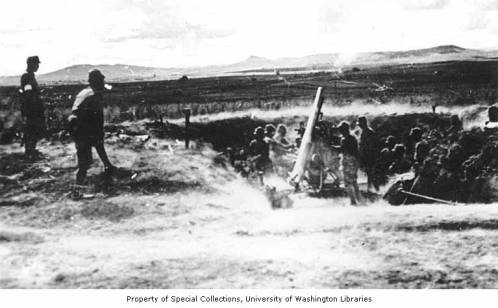 Japanese troops train with a Type 88 75 mm AA Gun on Attu in 1943.