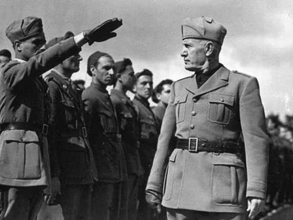 Benito Mussolini inspecting troops during the Second Abyssinian War.
