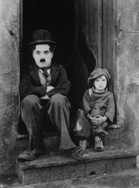Chaplin and Jackie Coogan in a publicity photo for The Kid.
