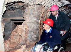 Bruce Cooper and Martin Nuza at the entrance to Operation Tracer (Stay Behind Cave) in Gibraltar. October 2008. The secret doorway of the passage to the chamber is on the left.Photo: Jim Crone CC BY-SA 3.0