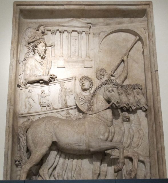 Marcus Aurelius celebrating his triumph over Rome’s enemies in 176 AD, riding in a quadriga chariot