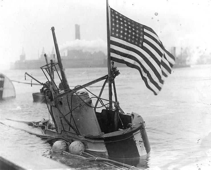 S-4 is towed to the Boston Navy Yard after being salvaged, 1928.