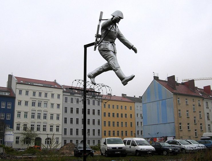 Sculpture called Mauerspringer (“Wall jumper”) by Florian and Michael Brauer and Edward Anders.Photo: Jotquadrat CC BY-SA 3.0