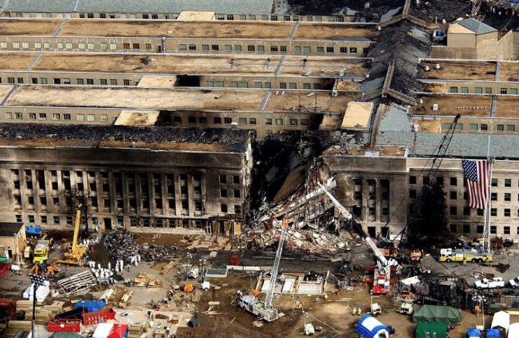 Aerial view of the Pentagon Building located in Arlington, Virginia showing emergency crews responding to the destruction caused when a high-jacked commercial jetliner crashed into the southwest corner of the building, during the 9/11 terrorists attacks.