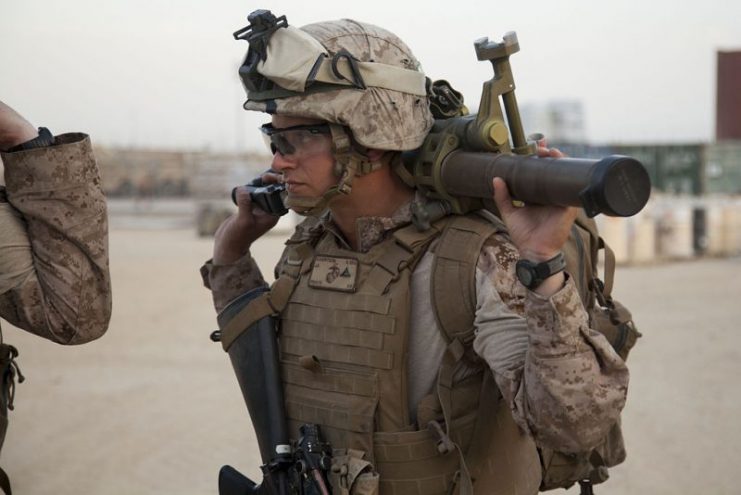 A U.S. Marine with Fox Company, 2nd Battalion, 8th Marine Regiment, Regimental Combat Team 7 prepares to conduct a mission rehearsal at Camp Leatherneck in Helmand province, Afghanistan