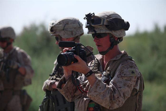 COP Castle, Helmand, Afghanistan – U.S. Marine Corps Cpl. Charles Mabry, a combat cameraman with the 2nd Marine Division Combat Camera, records video. Photo: Chief Warrant Officer 2nd Class Clinton W. Runyon