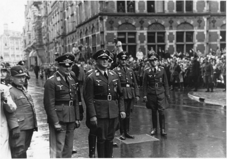 Air General Friedrich Christiansen (third from the left) arrives in The Hague at the Lange Poten street near the Plein square accompanied by a number of high ranking German officers.