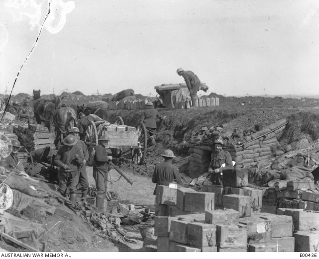 Members of the 2nd Division at a dump of front line supplies near ‘Iggery Corner’, during the fight for Bullecourt.