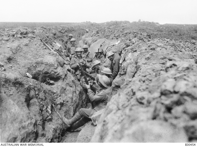 Australians in the second line of the trenches before Riencourt (near Bullecourt), in May 1917, cleaning their rifles in readiness for an attack.