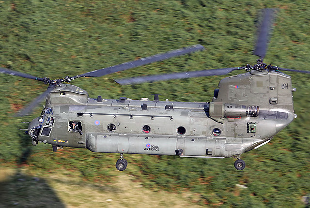 A Chinook helicopter (Bravo November) in the Pass of Dunmail Raise.This aircraft appeared to be in a Medical Emergency Response Team (MERT) formation exercise alongside another Chinook and an Apache attack helicopter providing cover to pick up a casualty in the field.Photo: Walter Baxter CC BY-SA 2.0