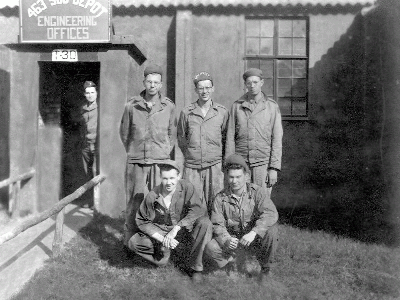 Photo of the AFCE and Bombsight shop ground crew in the 463rd Sub Depot affiliated with the USAAF 389th Bomb Group based at Hethel, Norfolk, England