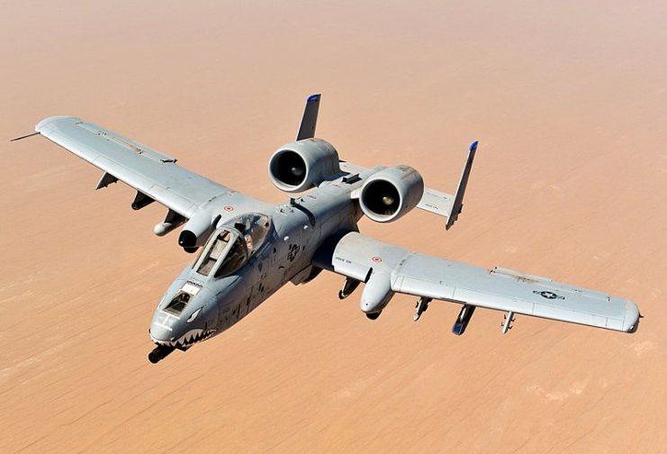 An A-10 Thunderbolt II, assigned to the 74th Fighter Squadron, Moody Air Force Base, GA, returns to mission after receiving fuel from a KC-135 Stratotanker, 340th Expeditionary Air Refueling Squadron, over the skies of Afghanistan in support of Operation Enduring Freedom, May 8, 2011.